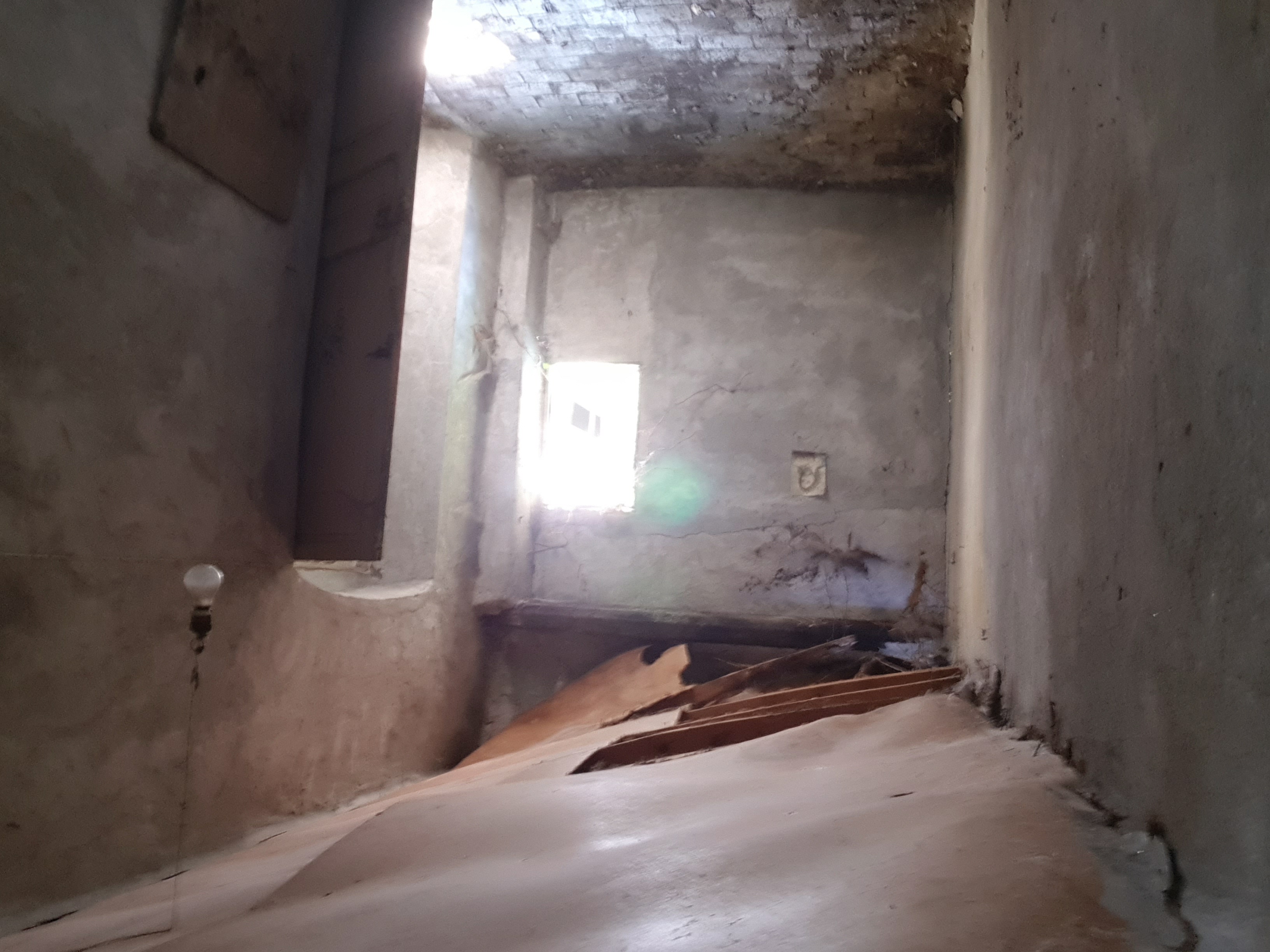 Internal corridor with stone arch