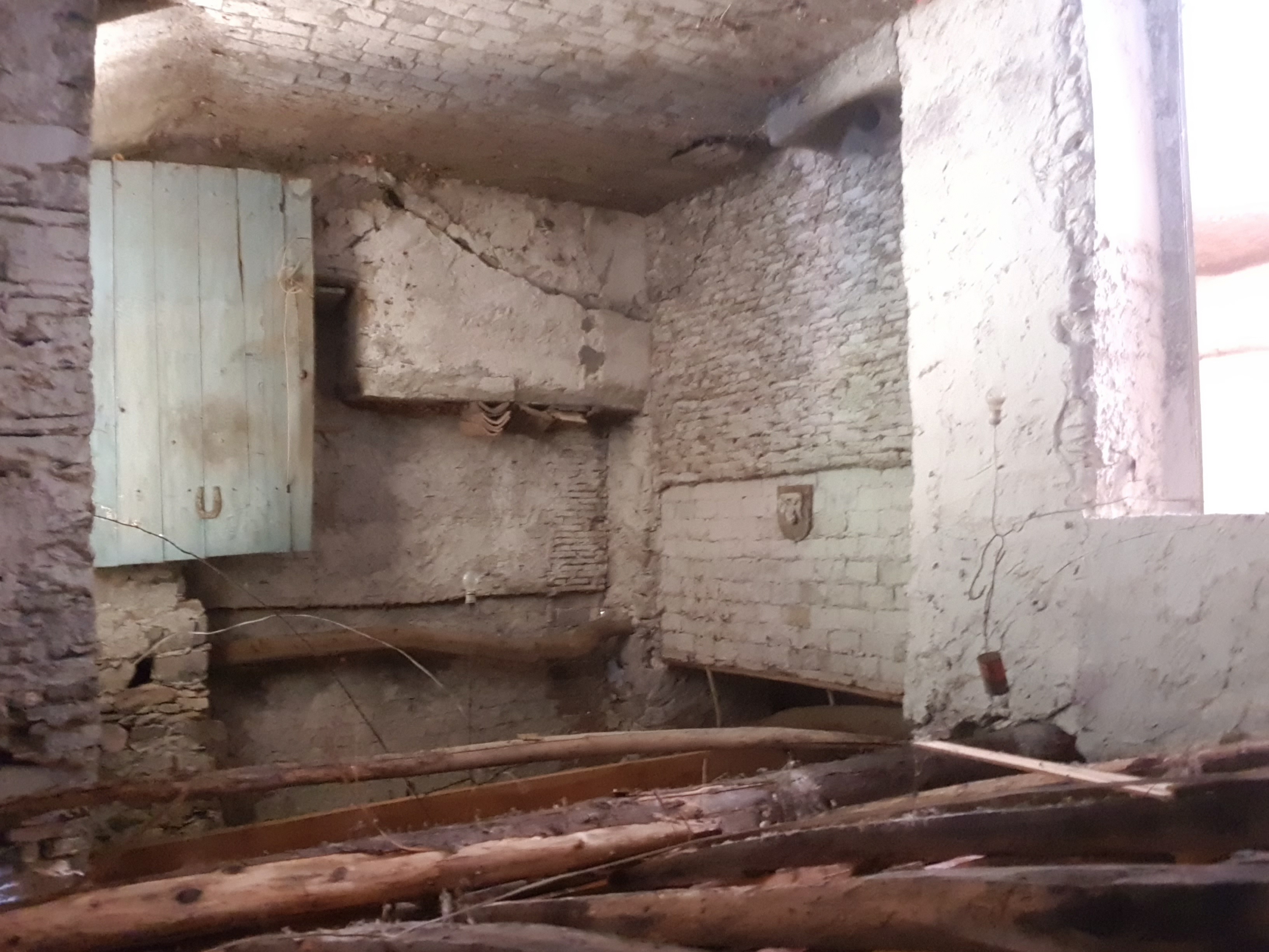 Internal hallway with light-blue door
